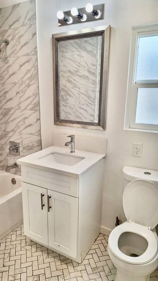 MOVE IN SPECIAL!!! $153 DOLLARS OFF FOR THE 1ST 3 MONTHS. Remodeled 3 bedroom 1.5 bath 2nd floor unit. - Photo 2 of 7