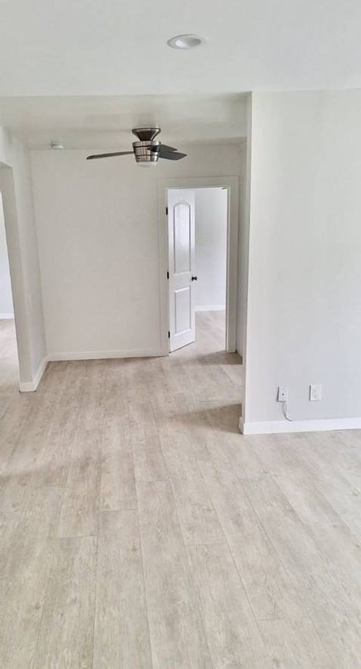 MOVE IN SPECIAL!!! $153 DOLLARS OFF FOR THE 1ST 3 MONTHS. Remodeled 3 bedroom 1.5 bath 2nd floor unit. - Photo 4 of 7