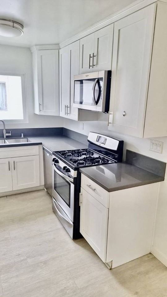 MOVE IN SPECIAL!!! $153 DOLLARS OFF FOR THE 1ST 3 MONTHS. Remodeled 3 bedroom 1.5 bath 2nd floor unit. - Photo 5 of 7