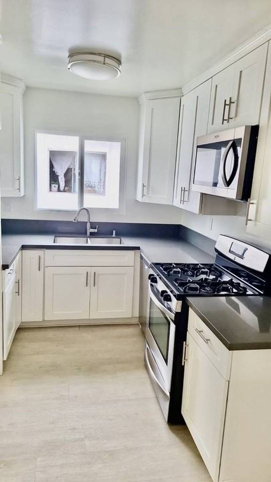 MOVE IN SPECIAL!!! $153 DOLLARS OFF FOR THE 1ST 3 MONTHS. Remodeled 3 bedroom 1.5 bath 2nd floor unit. - Photo 6 of 7