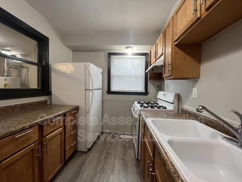 3102 W 40th Ave - Photo 2 of 8