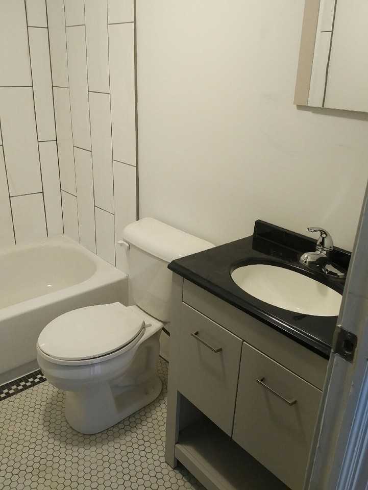 Brownstone on Margaret - Photo 3 of 4