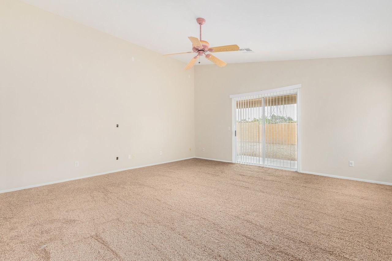 10595 N 115th Dr - Photo 3 of 18