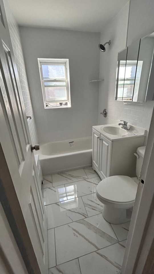 56-Village Court Apartments, LLC - Photo 4 of 28