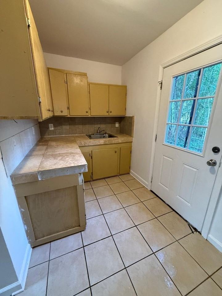 9156 3rd Ave - Photo 5 of 18