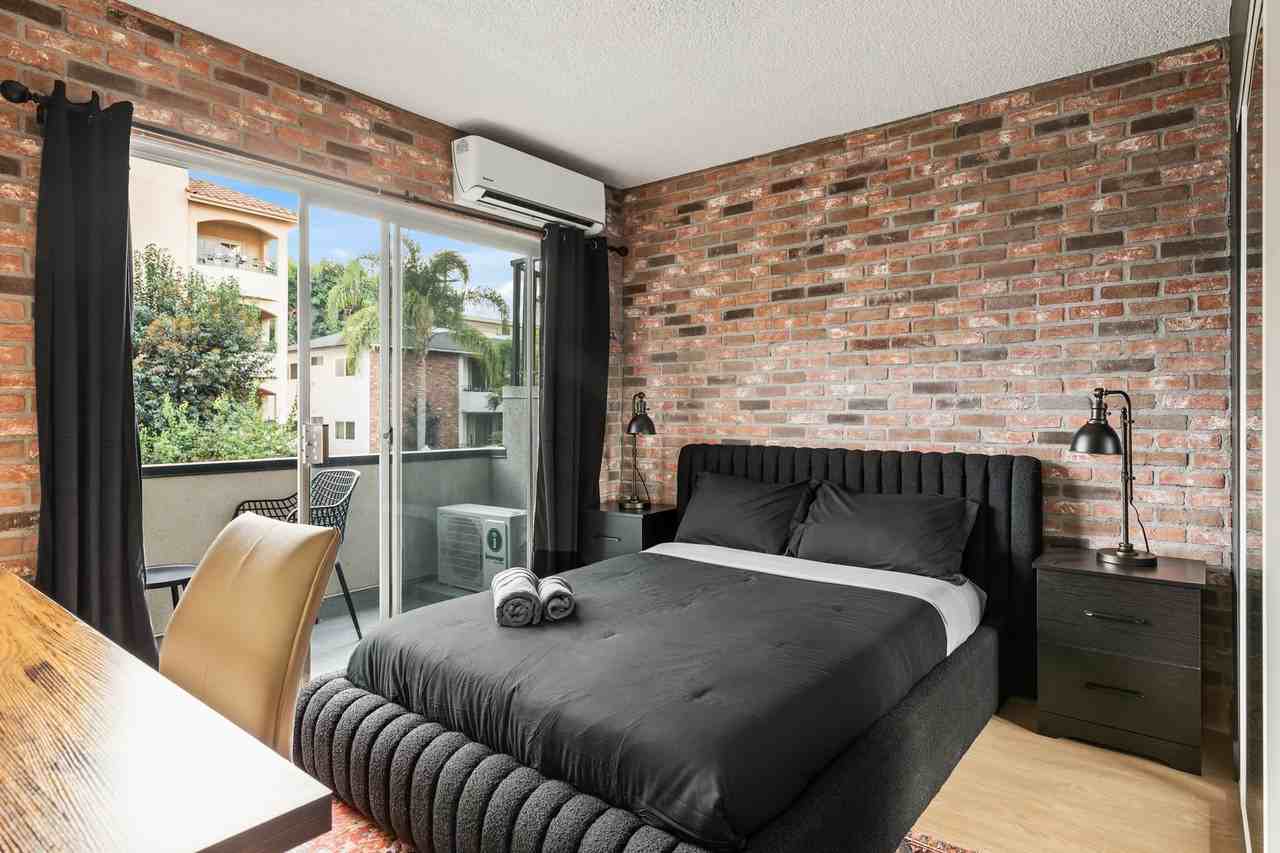 A 3 Bedroom, 2 Bathroom apartment with common areas and a fully functional kitchen at 1700 Malcolm Ave, Unit 204 - Photo 2 of 27