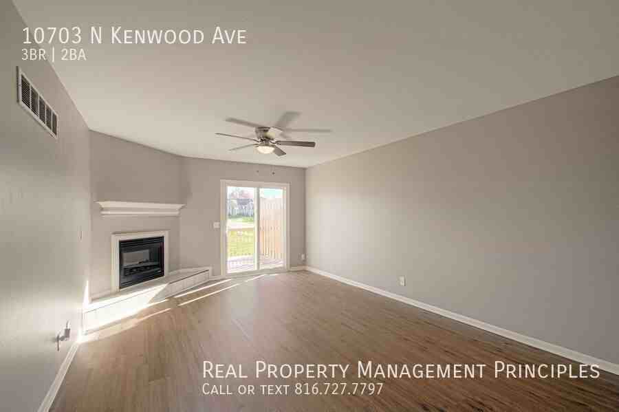 10703 N Kenwood Ave - Photo 2 of 30