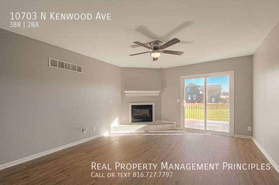 10703 N Kenwood Ave - Photo 3 of 30