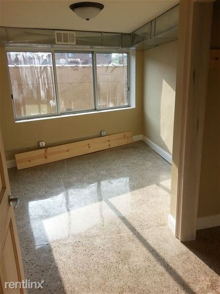 547 E Grand River Ave - Photo 2 of 10