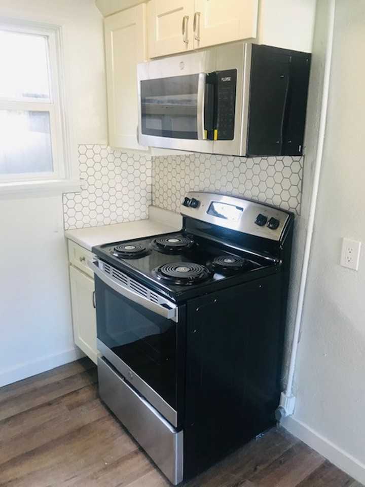 Updated with Stainless steel appliances and air conditioner - Photo 3 of 14