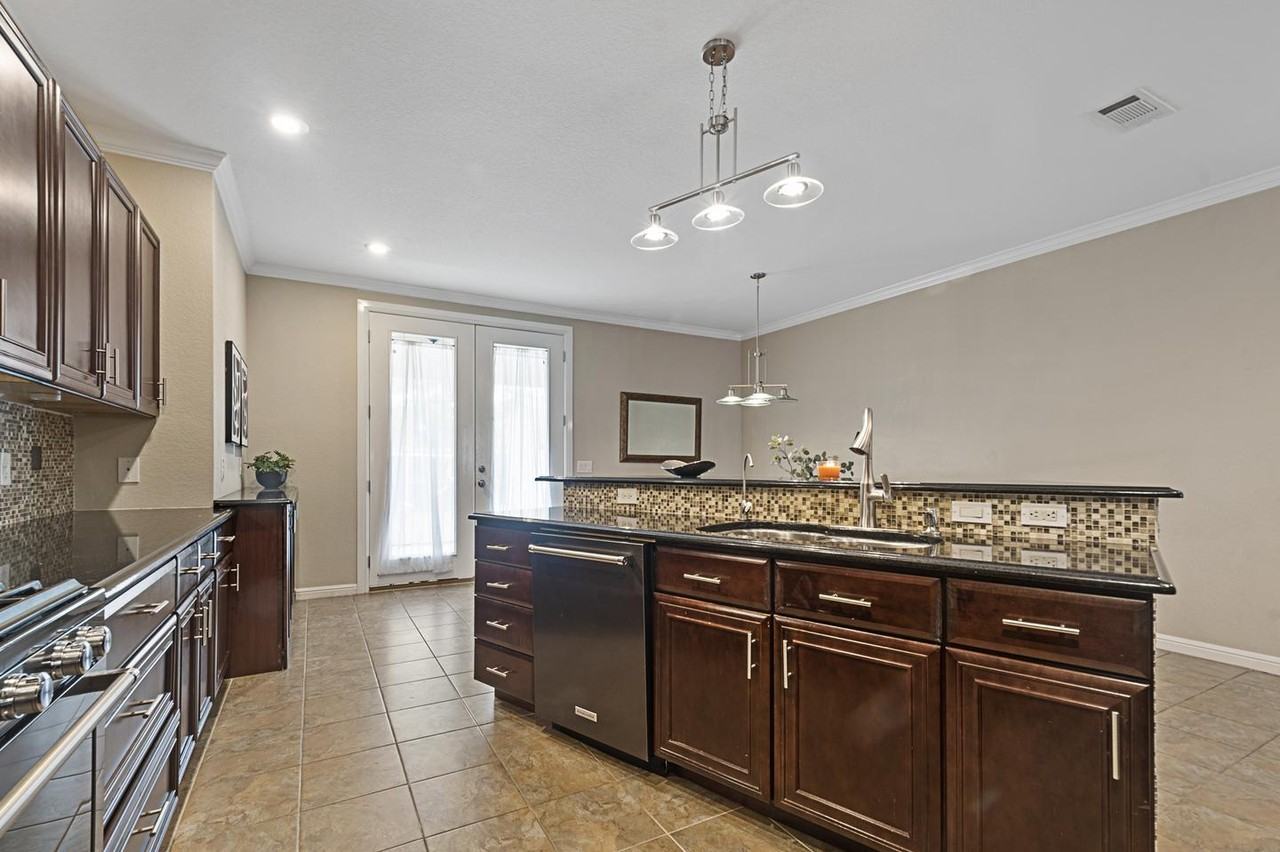 Delightful Grand Prairie home with a charming backyard - Photo 7 of 20