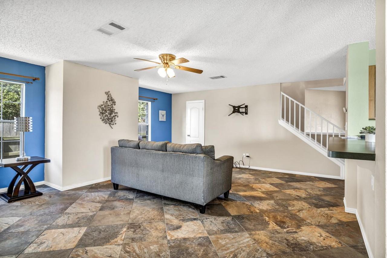 Pflugerville Dream Home with Designer Finishes and a Covered Patio - Photo 5 of 42