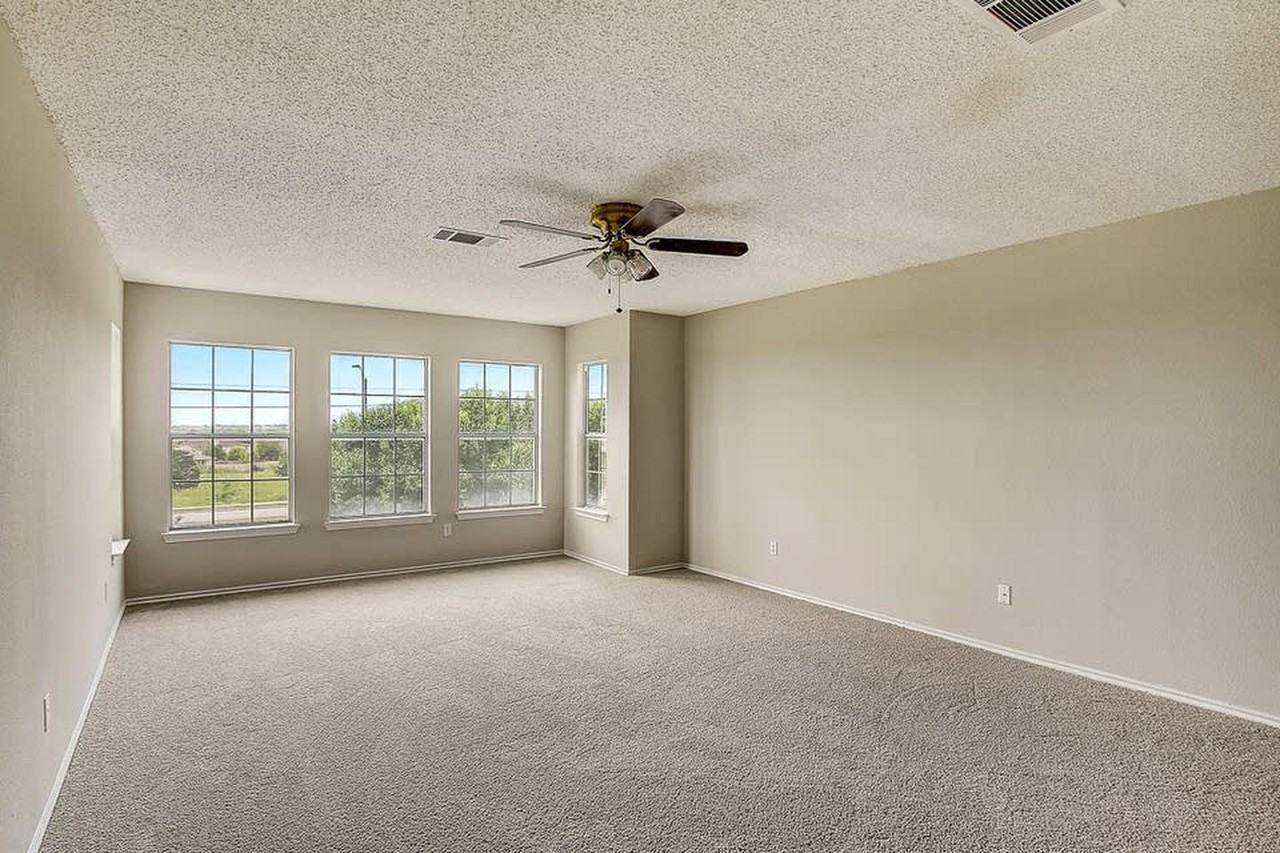 Pflugerville Dream Home with Designer Finishes and a Covered Patio - Photo 7 of 42