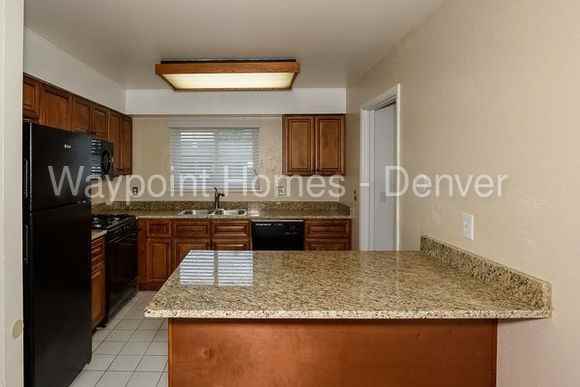 11969 E Iowa Ave - Photo 3 of 14