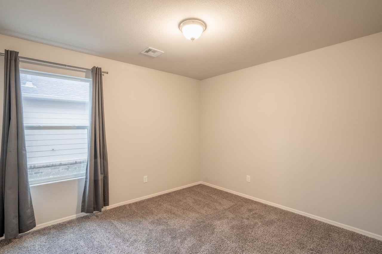 12303 N 130th East Ave - Photo 4 of 18