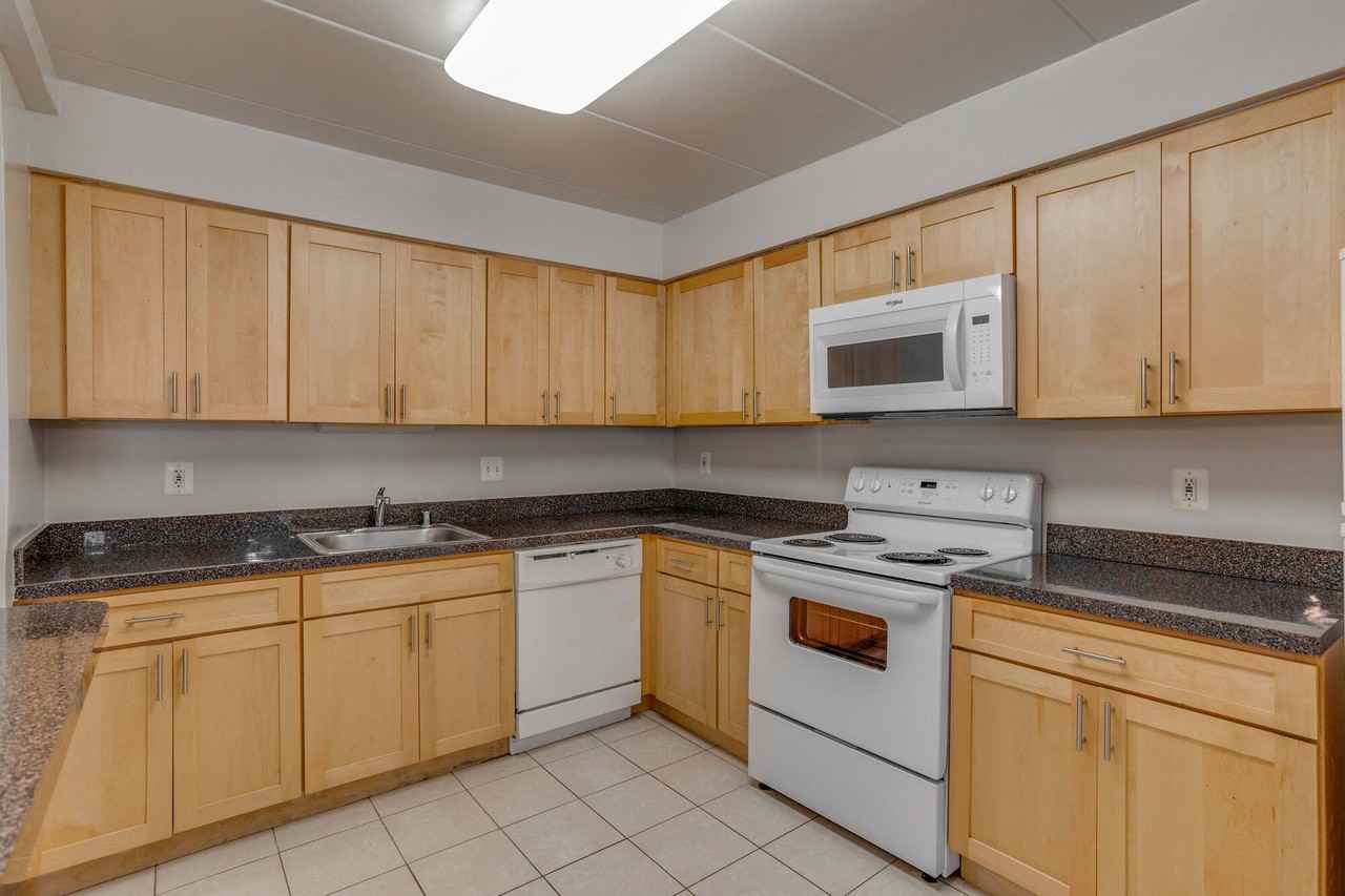 Whitney Apartments - Photo 6 of 39