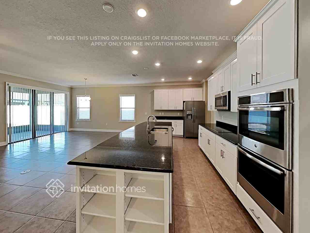 7539 39th Ave E - Photo 6 of 20