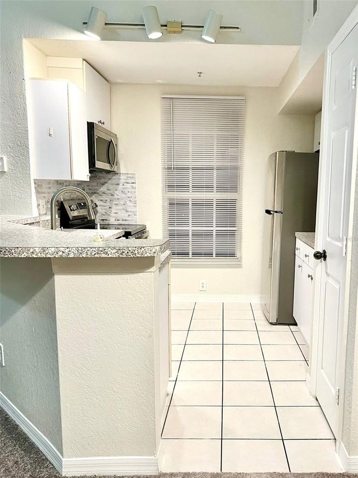 6360 Raleigh St - Photo 6 of 26