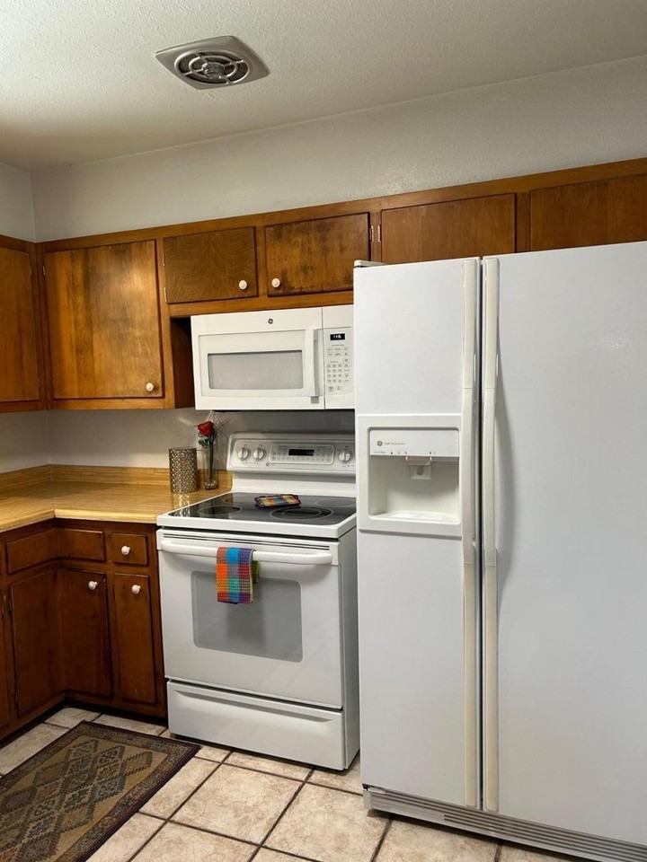 9808 Arvilla Ave Ne - Photo 3 of 23