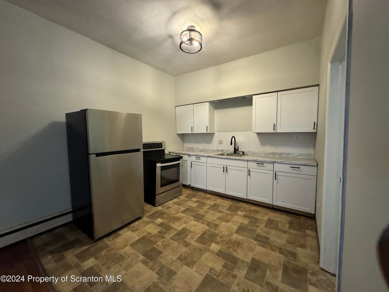 115 Lackawanna Ave - Photo 2 of 6