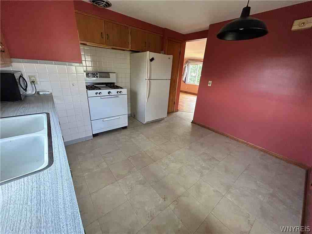 1201 George Urban Blvd - Photo 4 of 12