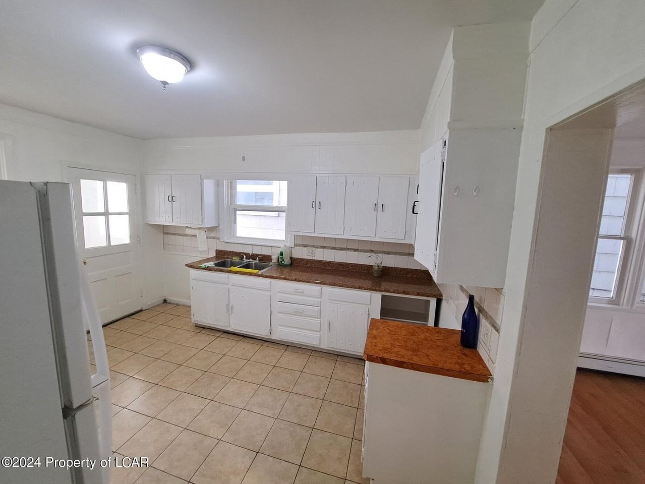 612 N Church St - Photo 3 of 10