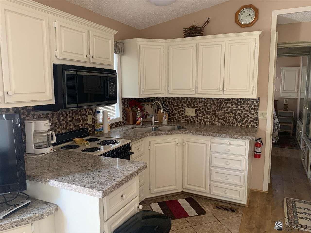 13698 East 50th Street - Photo 3 of 11