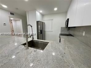 7720 Camino Real - Photo 3 of 23