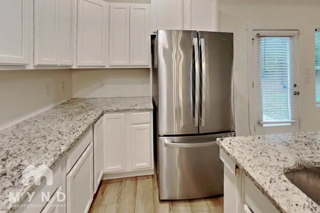 9980 Hunter Pl - Photo 3 of 26