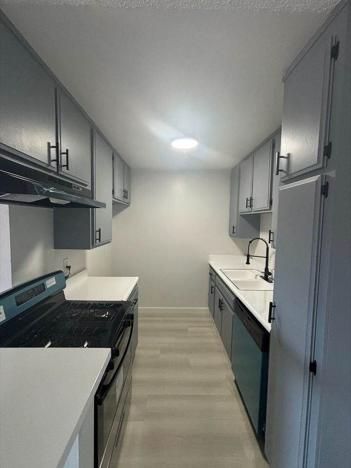 WOODCREST APARTMENTS - Photo 2 of 24