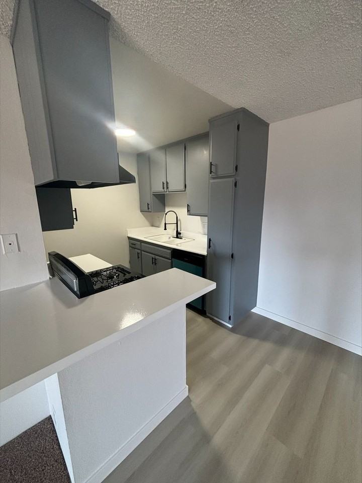 WOODCREST APARTMENTS - Photo 3 of 24