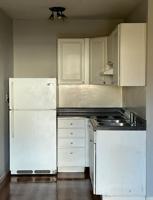 featured image of 102 N Manhattan Ave