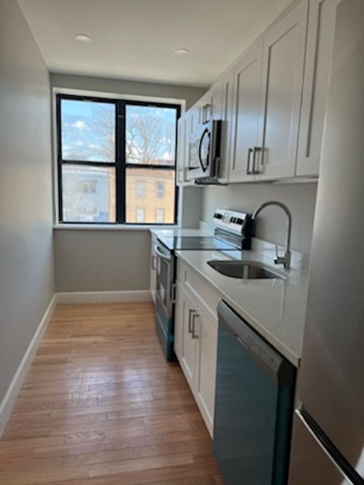 BRAND NEW RENOVATED APARTMENTS - Photo 5 of 18