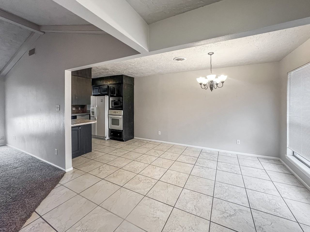 1210 W Kiowa Ave - Photo 3 of 15