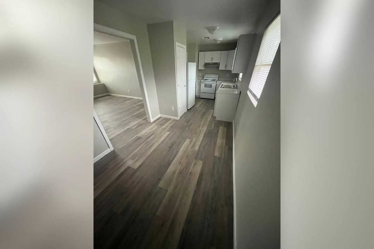 5618 N Garrison Ave - Photo 3 of 9