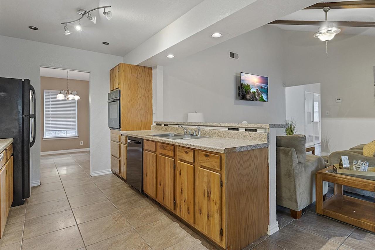 Elegant Rock Creek Home with Cozy Fireplace & Patio - Photo 5 of 18