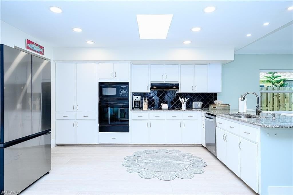 760 106th Ave N - Photo 7 of 35