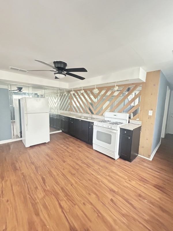 13220 S Vernon Ave - Photo 2 of 16