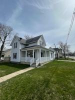 featured image of 103 E 7th St