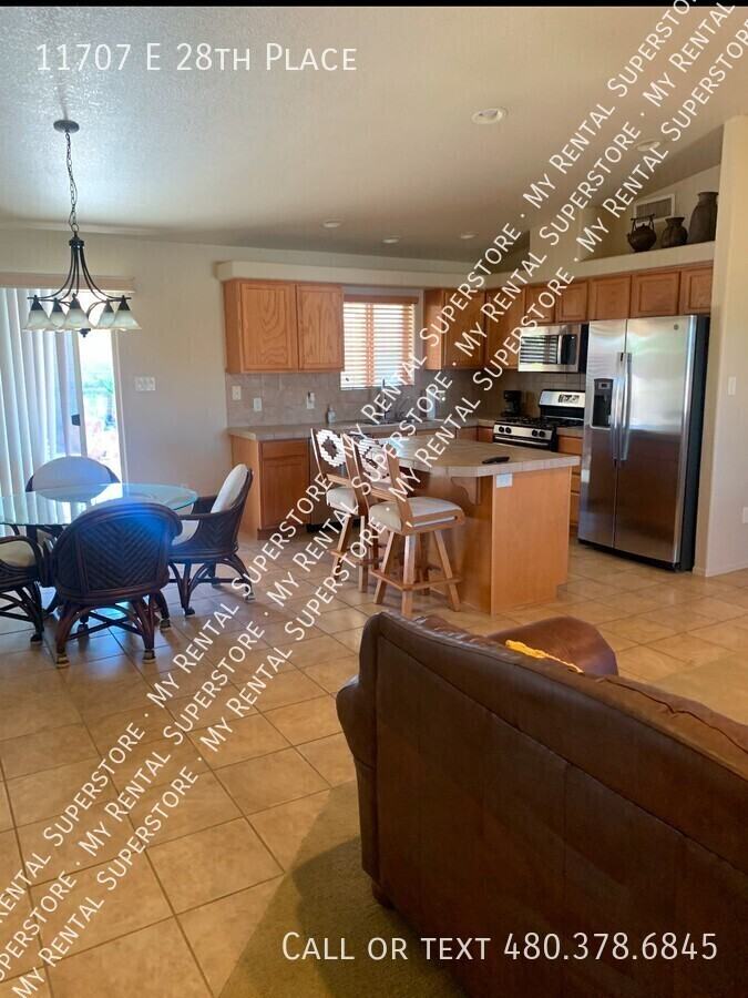 11707 E 28th Pl - Photo 2 of 15