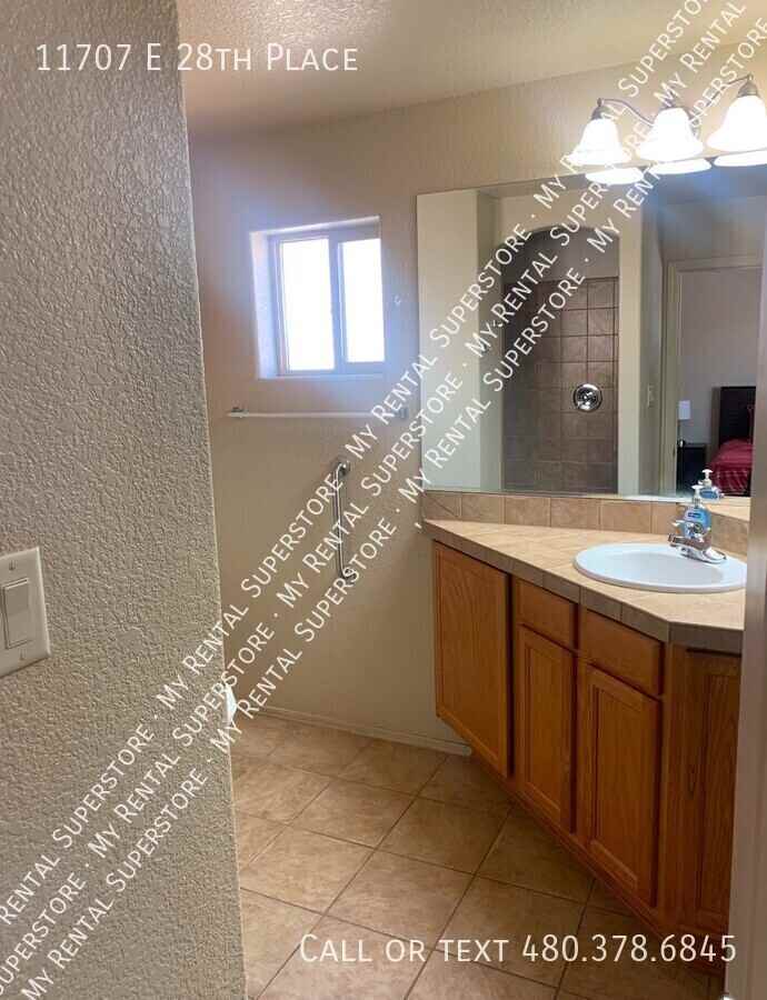 11707 E 28th Pl - Photo 5 of 15