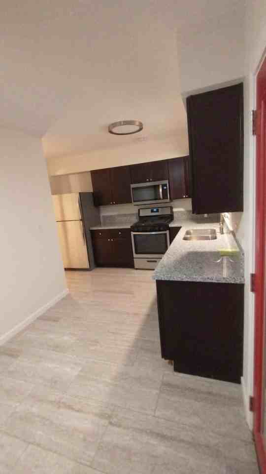 203 E 4th St - Photo 2 of 20
