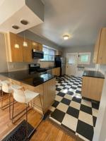 featured image of 310 E William St