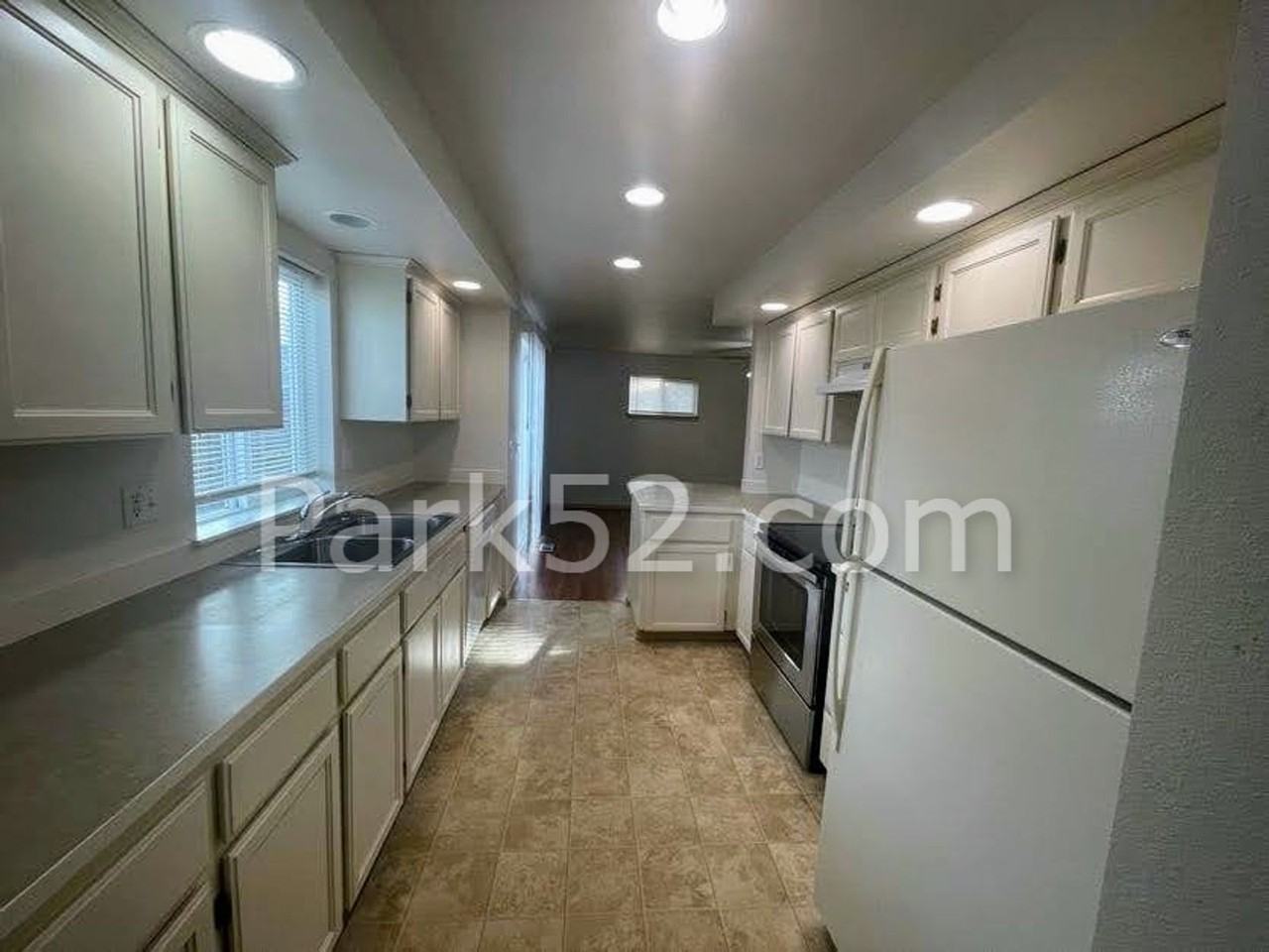 1425 82nd Street Ct E - Photo 5 of 23