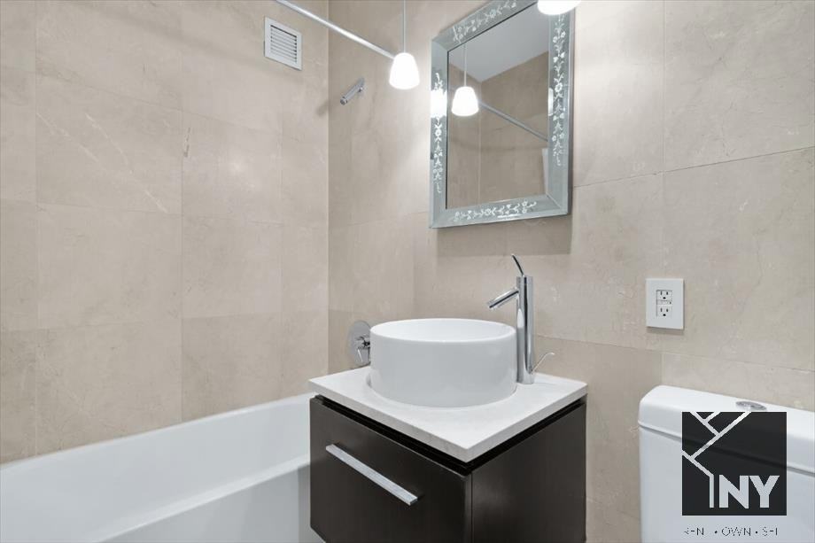 Wall St #1022 - Photo 5 of 9