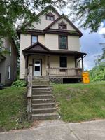 featured image of 159 W 5th St