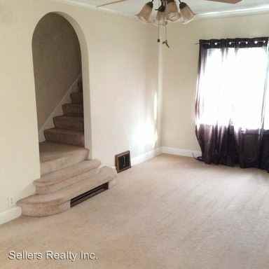 239 E 214th St - Photo 2 of 15