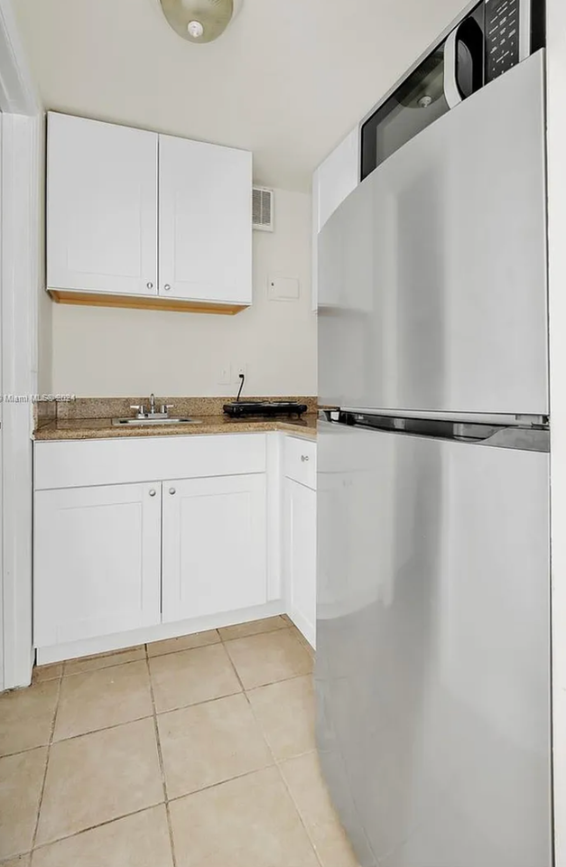 7885 Crespi Blvd - Photo 3 of 5