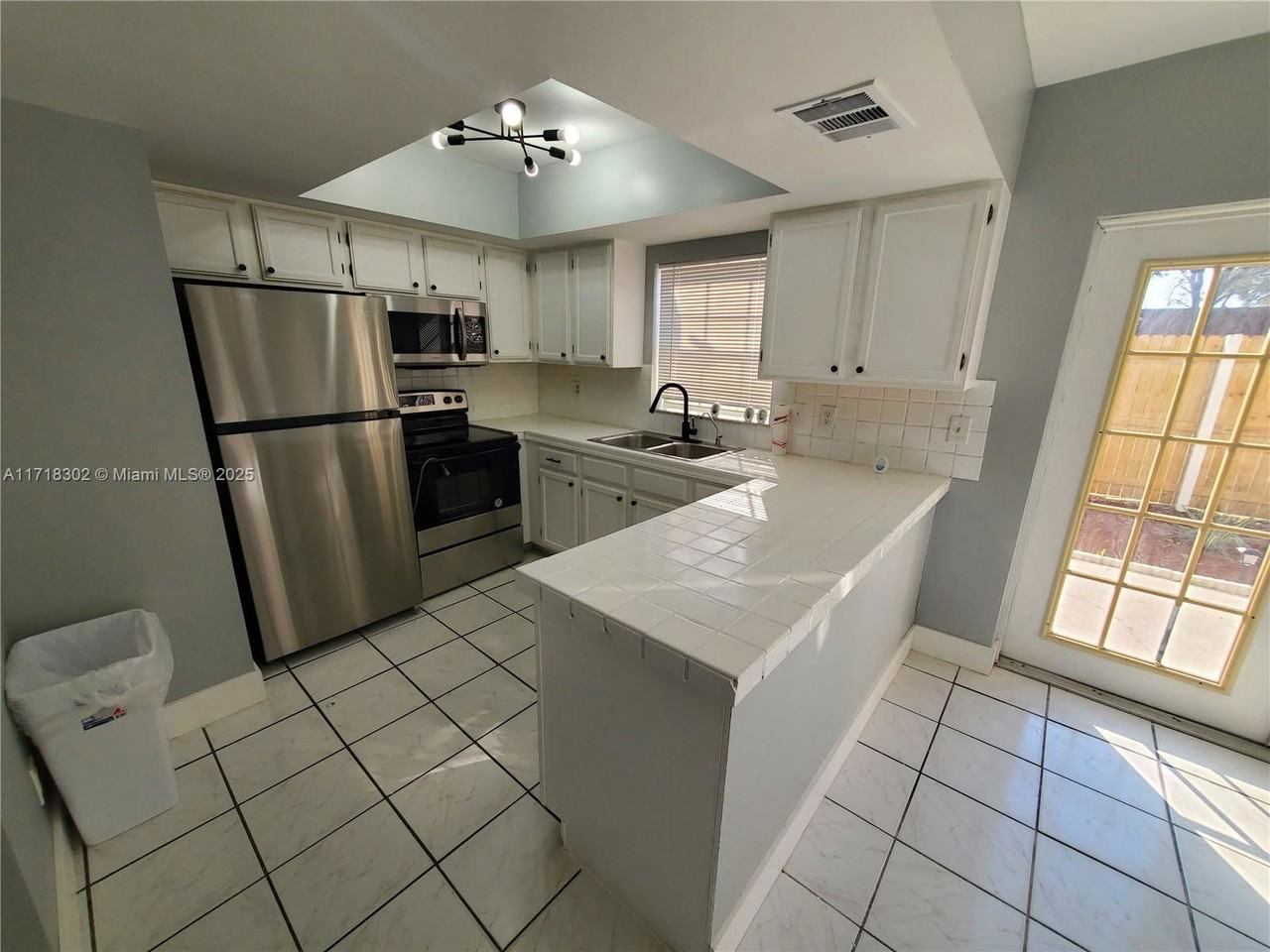 7926 Kimberly Blvd #202 - Photo 2 of 8