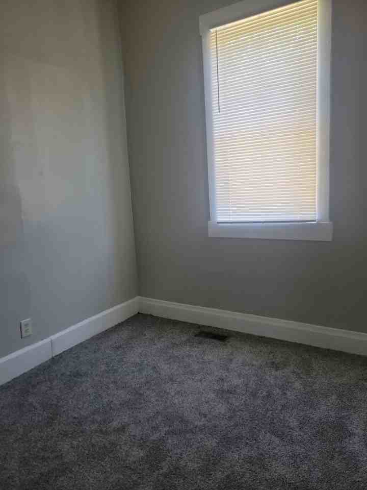 114 E 9th St - Photo 7 of 8